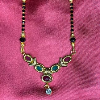 Black and Gold Beaded Necklace with Enamel Details