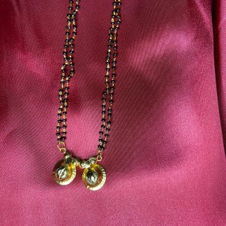 Fancy Black Bead Necklace with Goldist Pendant