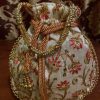 beige-and-red-potli